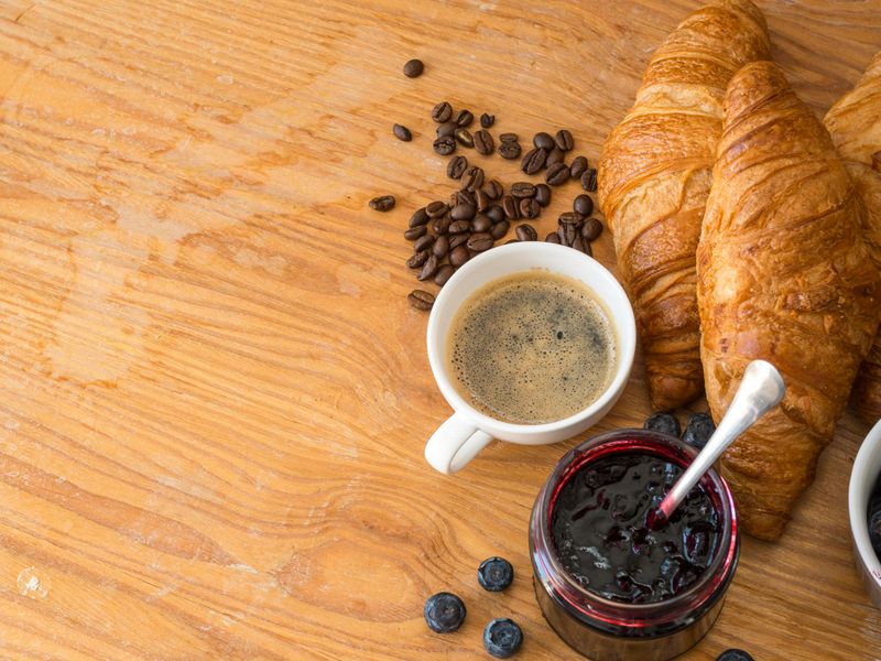 Italian breakfast at Hotel Colle Oppio — espresso, fresh cornetti, seasonal fruit and jam